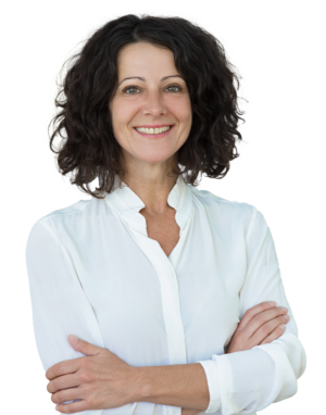 Adult female doctor with wavy hair smiling wearing a white shirt and crossing her arms